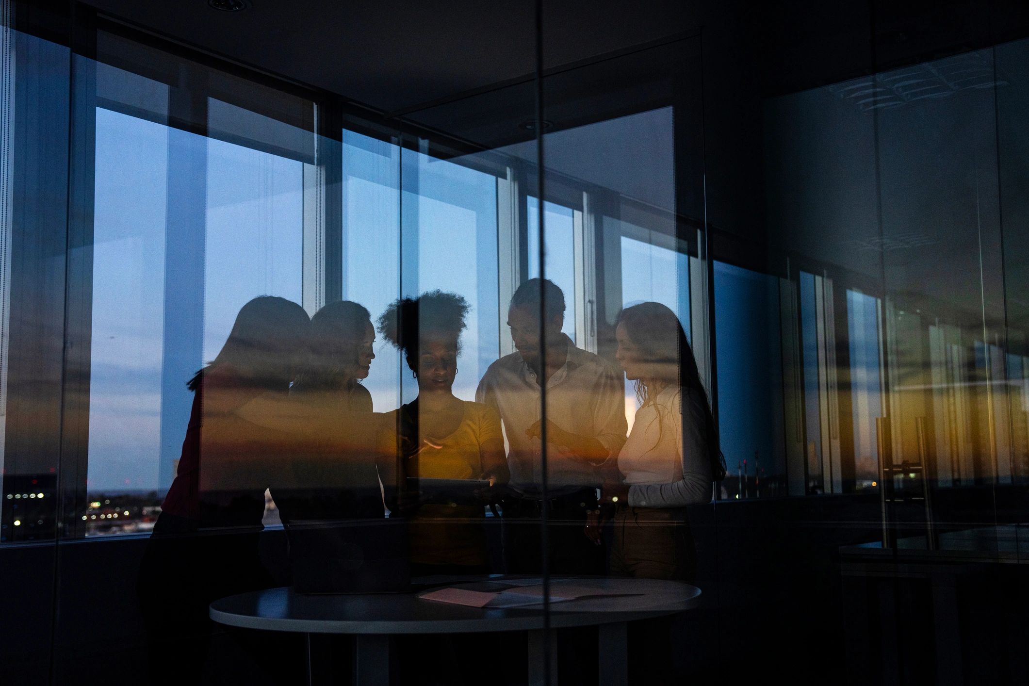 Professional real estate team meeting indoors